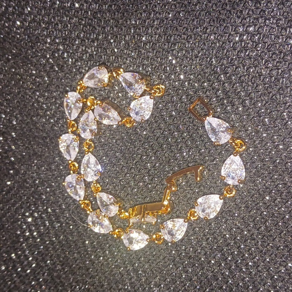 New! 14k gold plated, pear cut, tennis bracelet!